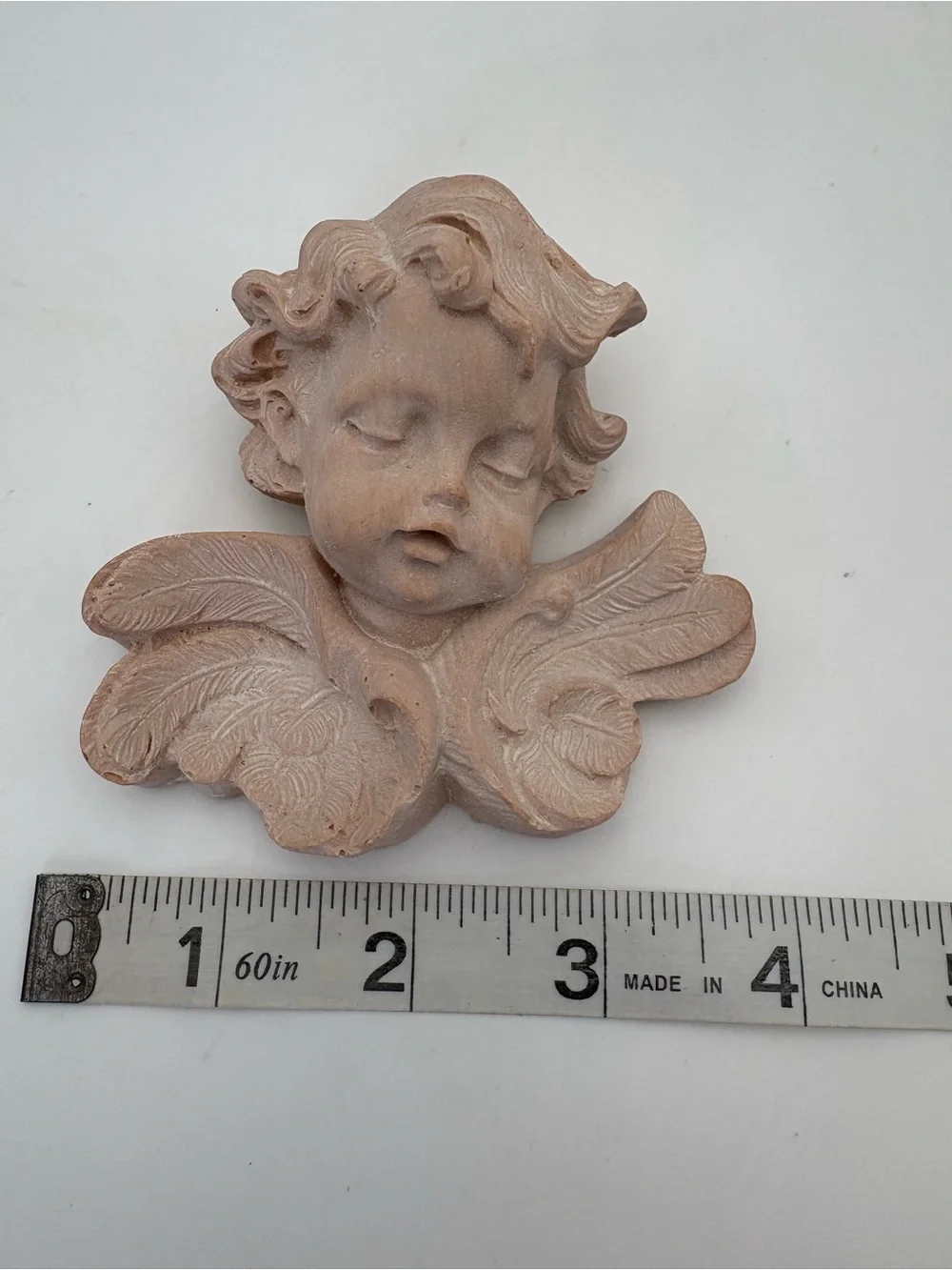 Decorative Cherub Wall Accent in Light Terracotta-colored Resin